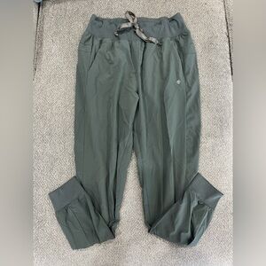 Green athletic joggers